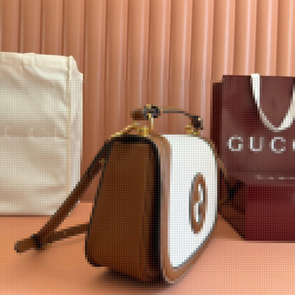 G*u*i blondie medium top handle bag
